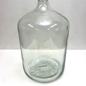 Vintage Clear Glass Jug Water Bottle 6 1/2 GALLON Embossed 1973 carboy coin 70s storage loft decor