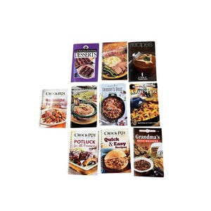 May include: A collection of cookbooks featuring recipes for slow cookers and Crock-Pots. Titles include "Desserts," "Sunday Suppers," "We Knight Favorites," "Season's Best," and "Quick & Easy Recipes." The books have colorful covers with images of prepared dishes.