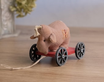Elefante de juguete de lino hecho a mano con ruedas (6,5 cm)