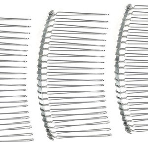 May include: Three silver hair combs with a curved shape and multiple teeth. The combs are designed for holding hair in place.
