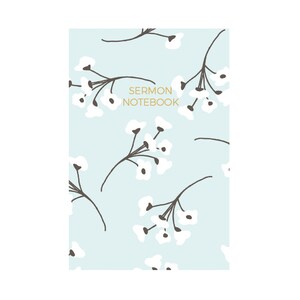 May include: A light blue notebook with the text "SERMON NOTEBOOK" in gold lettering. The cover features a repeating pattern of white flowers with brown stems on a light blue background.