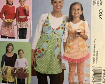 OOP 5720 McCalls (2008). McCalls Fashion Accessories.  Misses' & Girls' Aprons.  Complete, unused, neatly cut (by me).  Excellent condition.