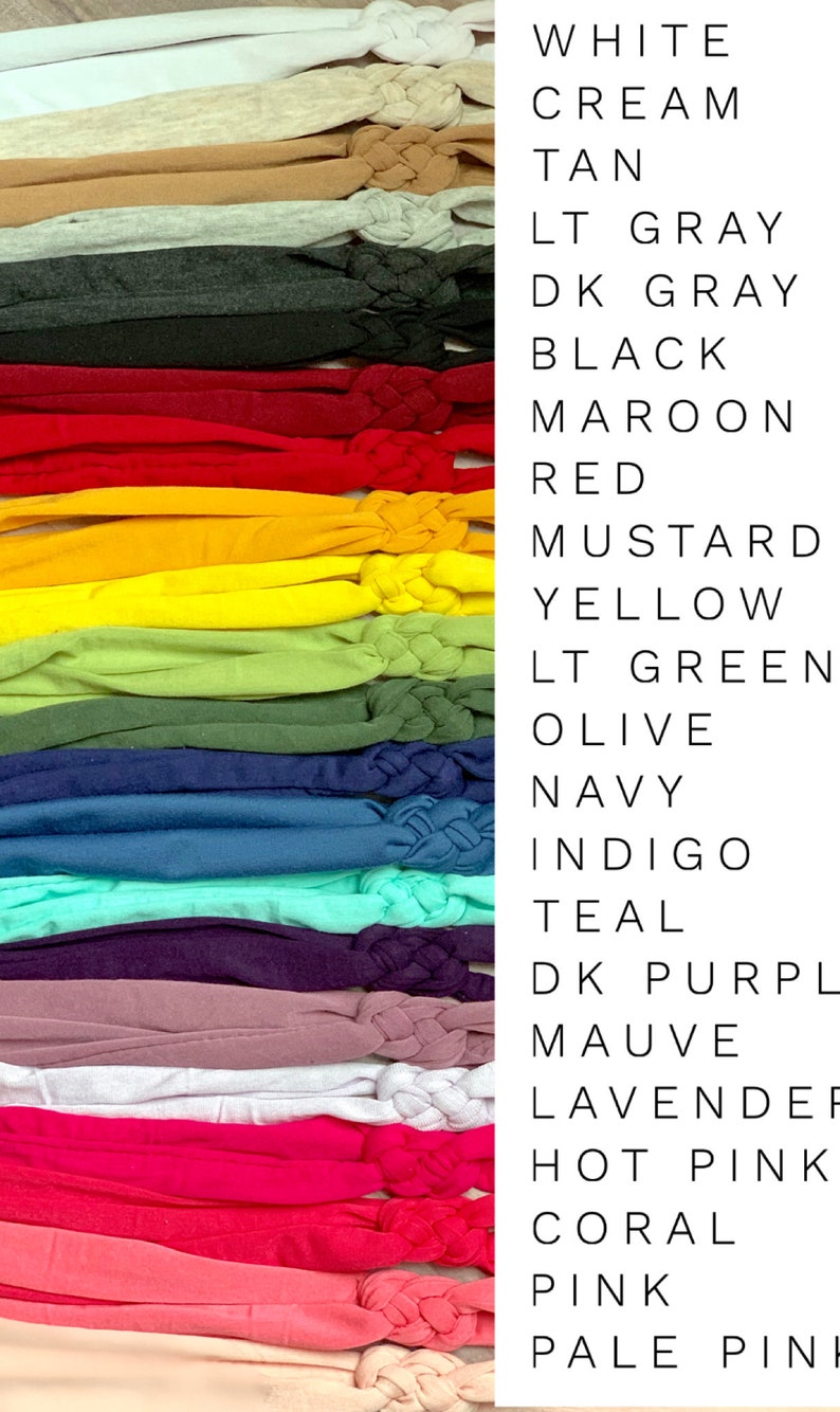 May include: A collection of 18 fabric headbands in various colours, including white, cream, tan, light grey, dark grey, black, maroon, red, mustard, yellow, light green, olive, navy, indigo, teal, dark purple, mauve, lavender, hot pink, coral, pink, and pale pink.