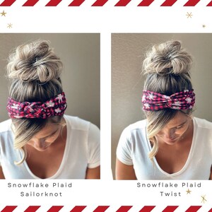 May include: Two women with blonde hair are wearing red and black plaid headbands with a snowflake pattern. The headband on the left is tied in a sailor knot, while the headband on the right is tied in a twist.