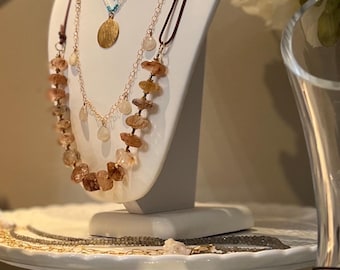Aragonite beads on a fine leather cord