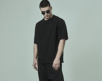 Top preto oversized Consensus com meia manga / POWHA