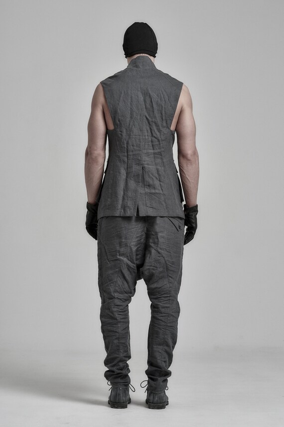 grey sleeveless jacket