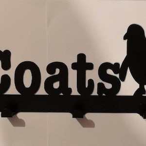 Penguins coat. Dressing gown towel etc hooks