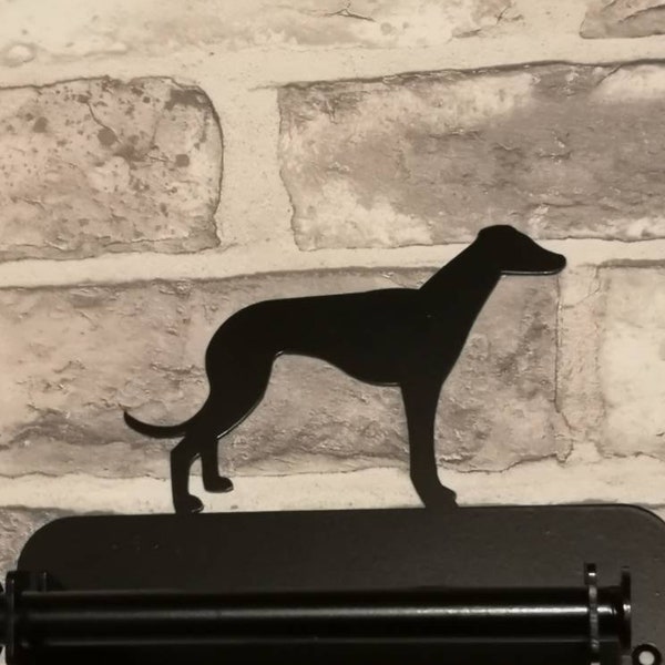 Toilet roll holder features a whippet dog