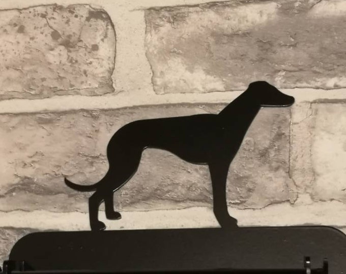 Toilet roll holder features a whippet dog