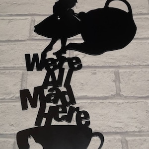 We&#39;re all made here metal wall art