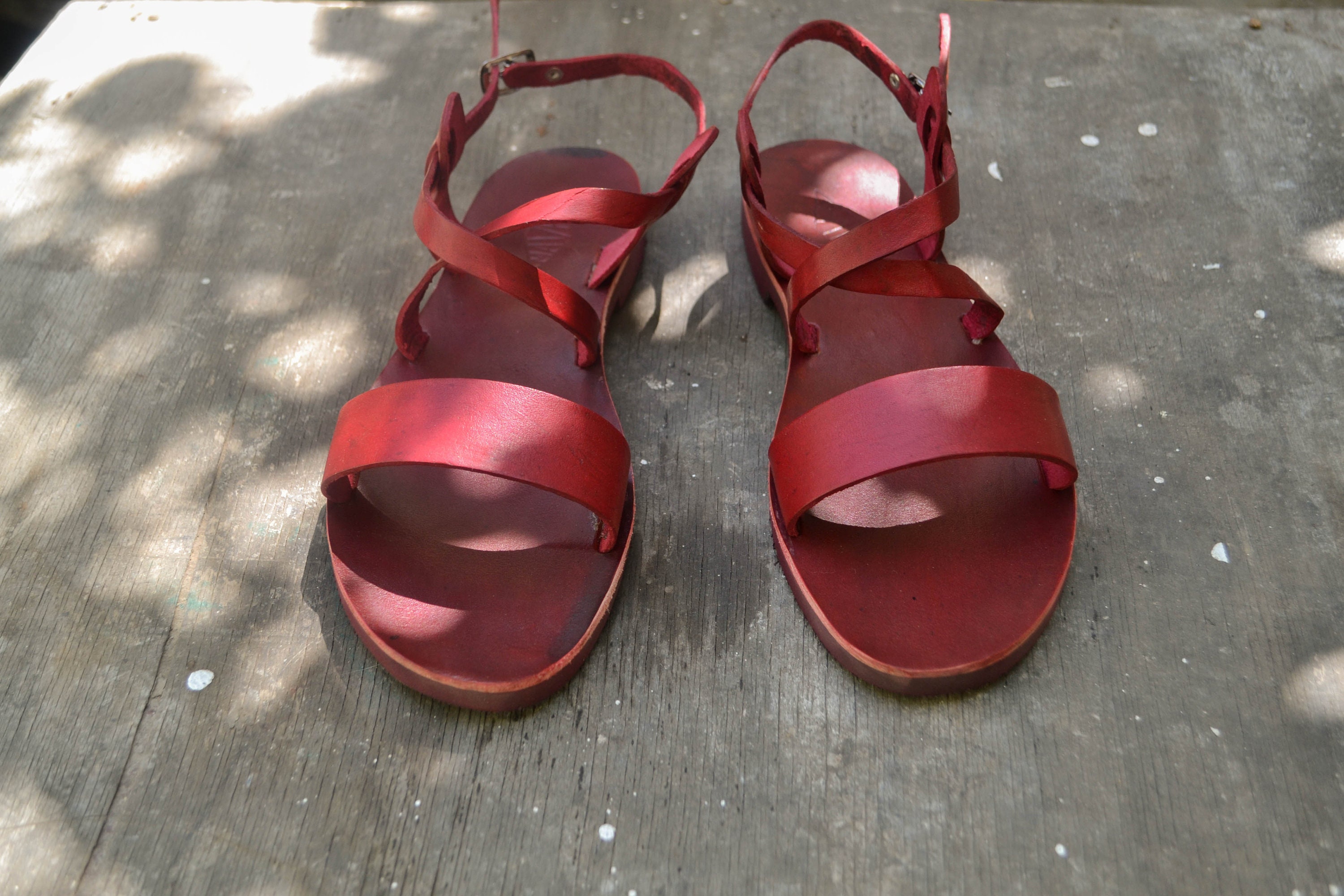 red studded flat sandals