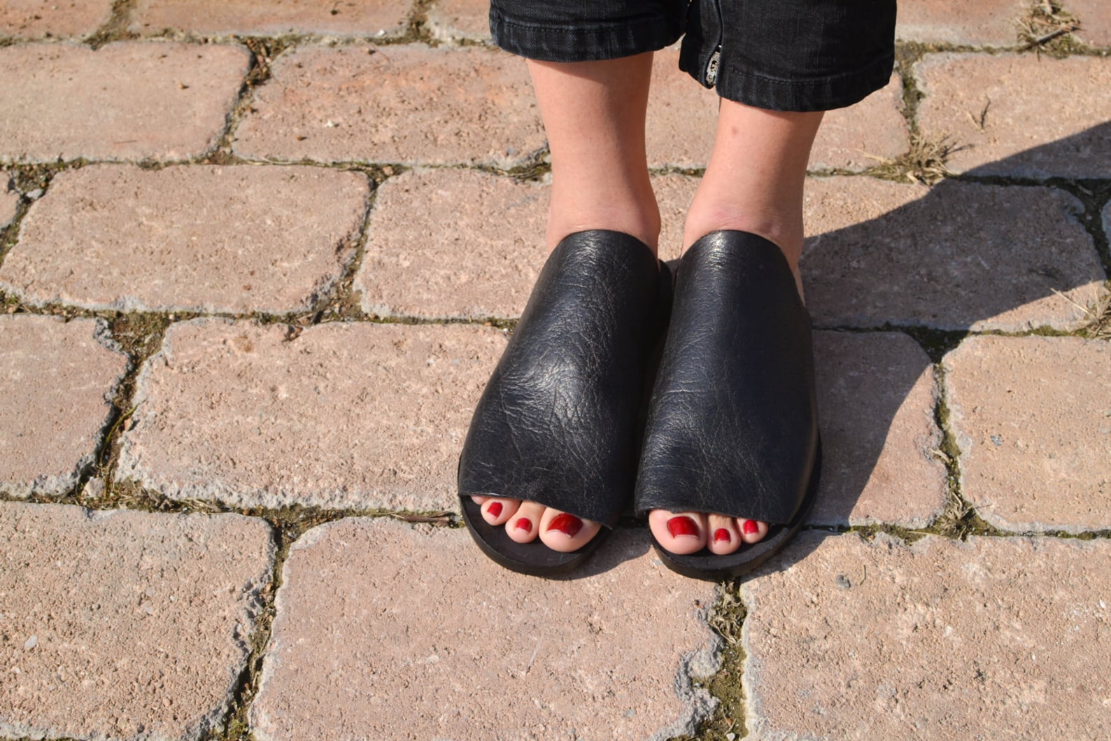 black leather slippers