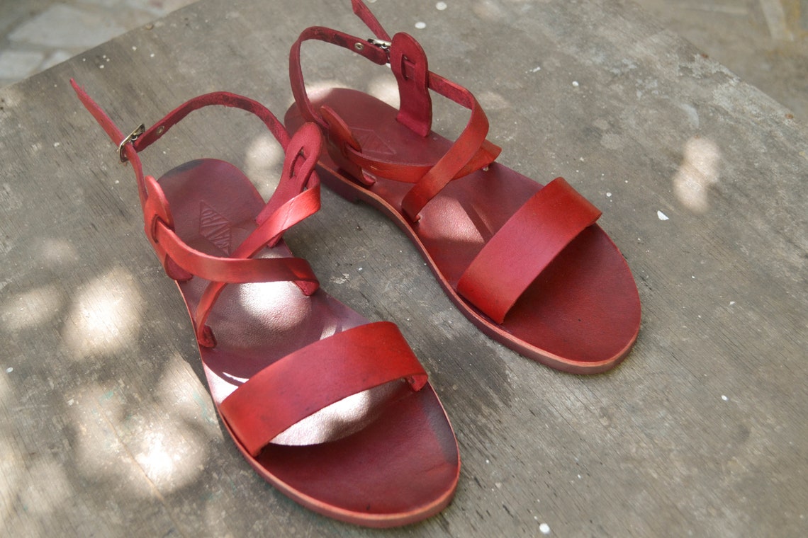 red studded flat sandals