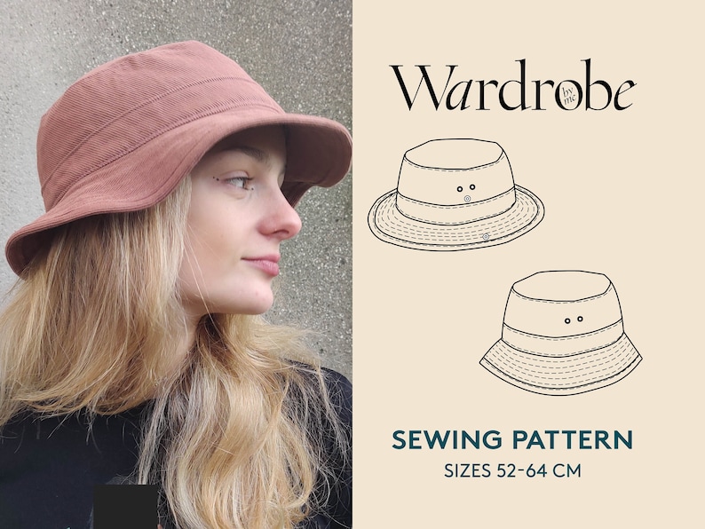 May include: A sewing pattern for a brown bucket hat, with a line drawing of the hat in two sizes, 52-64 cm. The pattern is called "Wardrobe by me".