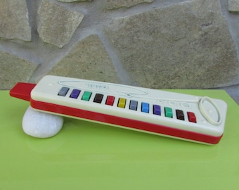 Image result for toy melodica buttons