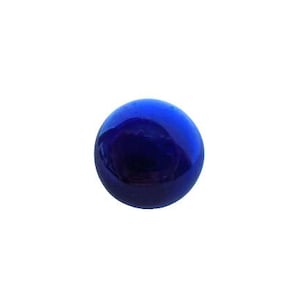 May include: A single, glossy, deep blue marble. The spherical glass toy has a reflective surface, with highlights and shadows creating depth. The marble is set against a plain white background.