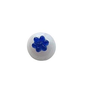 May include: White glass marble with a blue flower design.