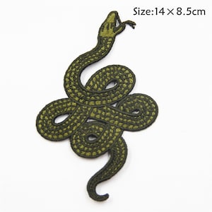 May include: Green embroidered snake patch, measuring 14 x 8.5 cm. The snake is coiled and has a detailed design.