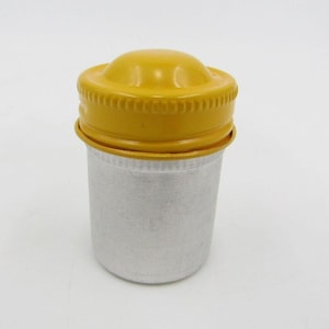 Vintage Aluminum 35 mm Unbranded Film Canister with Yellow Lid - Retro Photography Storage Container