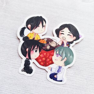 May include: Four cartoon characters are gathered around a table with a red and gold patterned tablecloth. They are all smiling and appear to be enjoying each other's company. The characters are all wearing different outfits and have different hair colors.