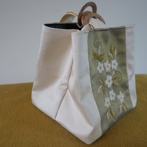 Silk bag with embroided flowers