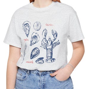 East Coast, Maine, Cape Cod, Seafood Lovers Unisex Jersey Tee, Gift for Foodies, Casual Wear, Lobster and Oyster Art, Perfect for Summer