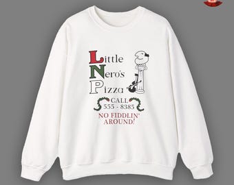 Mamma, ho perso l'aereo, felpa con il logo di Little Nero's Pizza, maglione natalizio ispirato al film.