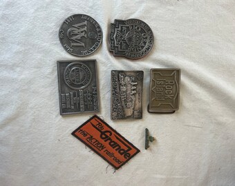 Collection of Vintage Railroad Belt Buckles and Paperweights