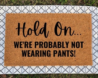 Hold On We're Probably Not Wearing Pants | Housewarming Gift | Funny Doormat | Funny Gift | Welcome Mat | Home Doormat | Funny Door Mat