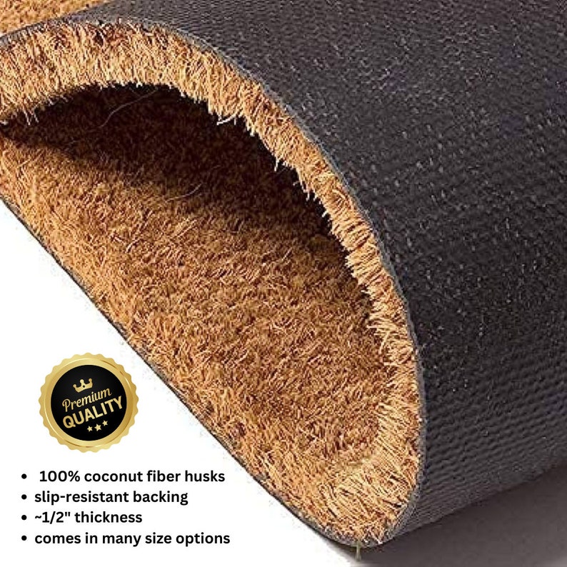 May include: A close-up of a brown coir doormat with a black rubber backing. The doormat is made of 100% coconut fiber husks and is slip-resistant. It is approximately 1/2 inch thick and comes in many sizes.
