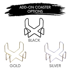 May include: Image shows three metal coaster holders in black, gold, and silver. The holders have a unique geometric design. Text at the top reads "ADD-ON COASTER OPTIONS". Each holder is labeled with its color: "BLACK", "GOLD", and "SILVER".