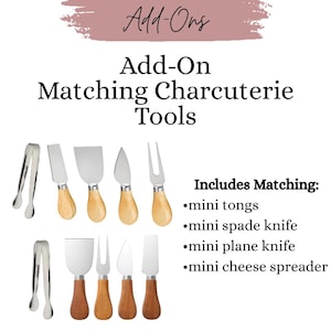 May include: Add-On Matching Charcuterie Tools. The image shows a set of mini charcuterie tools, including tongs, spade knife, plane knife, and cheese spreader. The tools have wooden handles and stainless steel blades.
