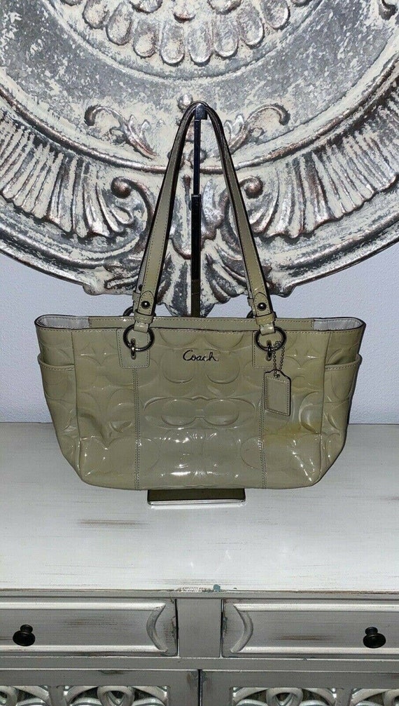 coach bolsa serial number
