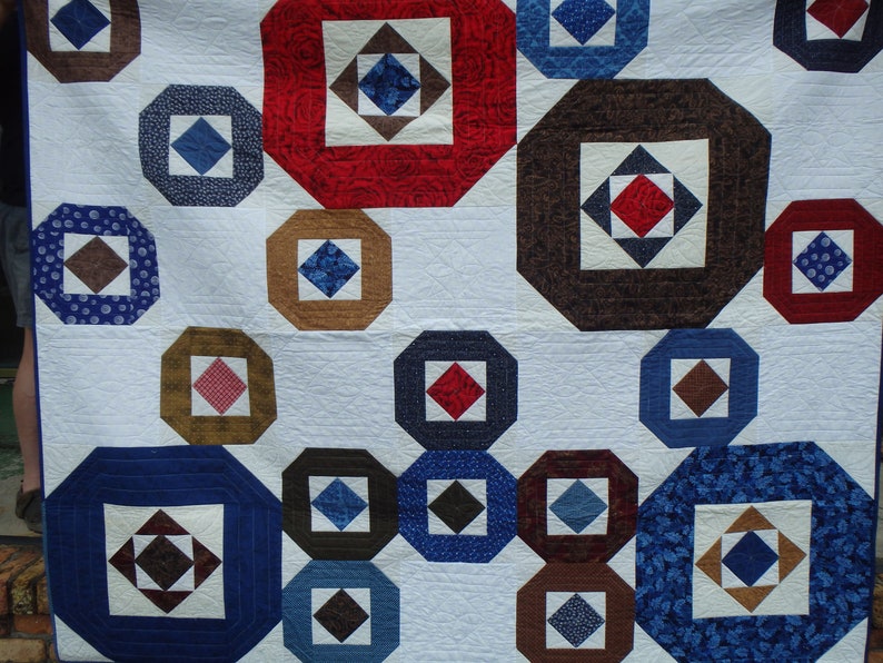 modern queen size red, blue and brown quilt image 2