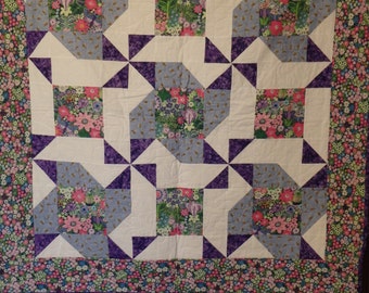 homemade quilt, baby girl quilt, girl's quilt, blue quilt, purple quilt, floral quilt, lap quilt, wheelchair quilt