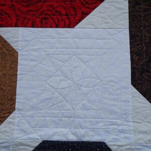 modern queen size red, blue and brown quilt image 3