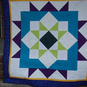 Blue and green modern geometric quilt