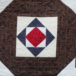 modern queen size red, blue and brown quilt image 4