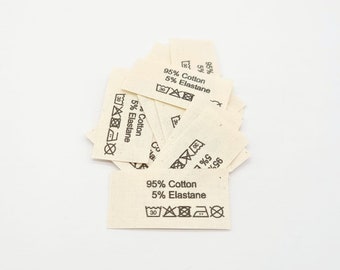 50 textile labels made of natural cotton ribbon with the inscription 95% Cotton 5 Elastane (English)