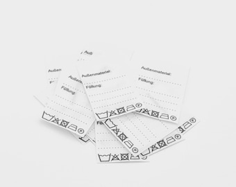 25 universal labels with outer material / filling on mixed tape