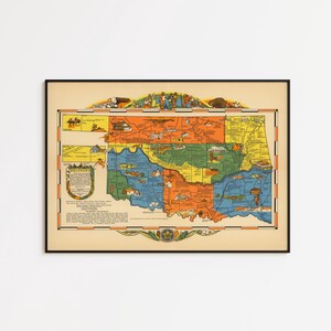 May include: A framed vintage map of Oklahoma, featuring a colorful design with orange, blue, green, and yellow sections. The map includes illustrations and text, framed in a black border.