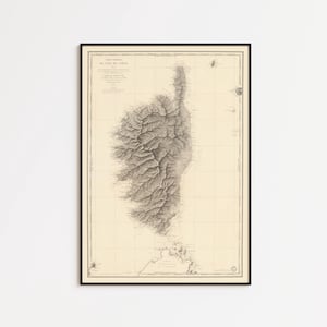 Puede incluir: Mapa antiguo enmarcado de Córcega, Francia, en blanco y negro. El mapa detalla la topografía de la isla con relieve sombreado, sobre un fondo crema con líneas de cuadrícula. El mapa está encerrado en un marco negro.
