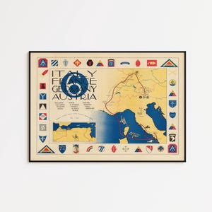 May include: A framed historical map print titled Italy, France, Germany, Austria with a large blue number 6. The map features red route lines, military unit insignia borders, and a smaller inset map of North Africa on a cream-colored background.