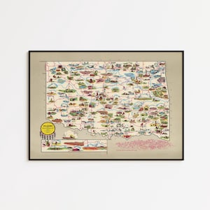 May include: A framed pictorial map of Oklahoma featuring a beige background with colorful illustrations of landmarks, wildlife, and historical scenes across the state, including a yellow circular emblem with the text Oklahoma in the lower left corner.