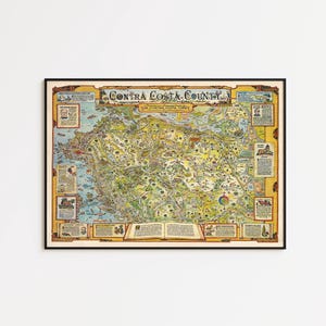 May include: A framed vintage map of Contra Costa County, California, with detailed illustrations and text. The map features a colorful design with a black frame, showcasing the county's geography and landmarks.