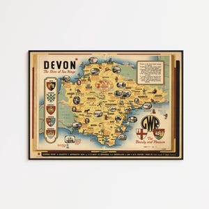 May include: Framed vintage map of Devon, England, with illustrations of landmarks and the text "Devon, The Shire of Sea-Kings." Includes the GWR logo and the phrase "For Beauty and Pleasure."