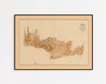 May include: Framed vintage map of Crete, Greece, in shades of brown and beige. The map is detailed, showing the island's topography and features. The map is enclosed in a black frame.