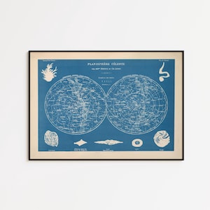 May include: Framed vintage celestial map print. The blue and white map features two circular star charts with detailed illustrations and text. The print is in a black frame, ready to hang. The text on the map reads "PLANTISPHERE CELESTE".