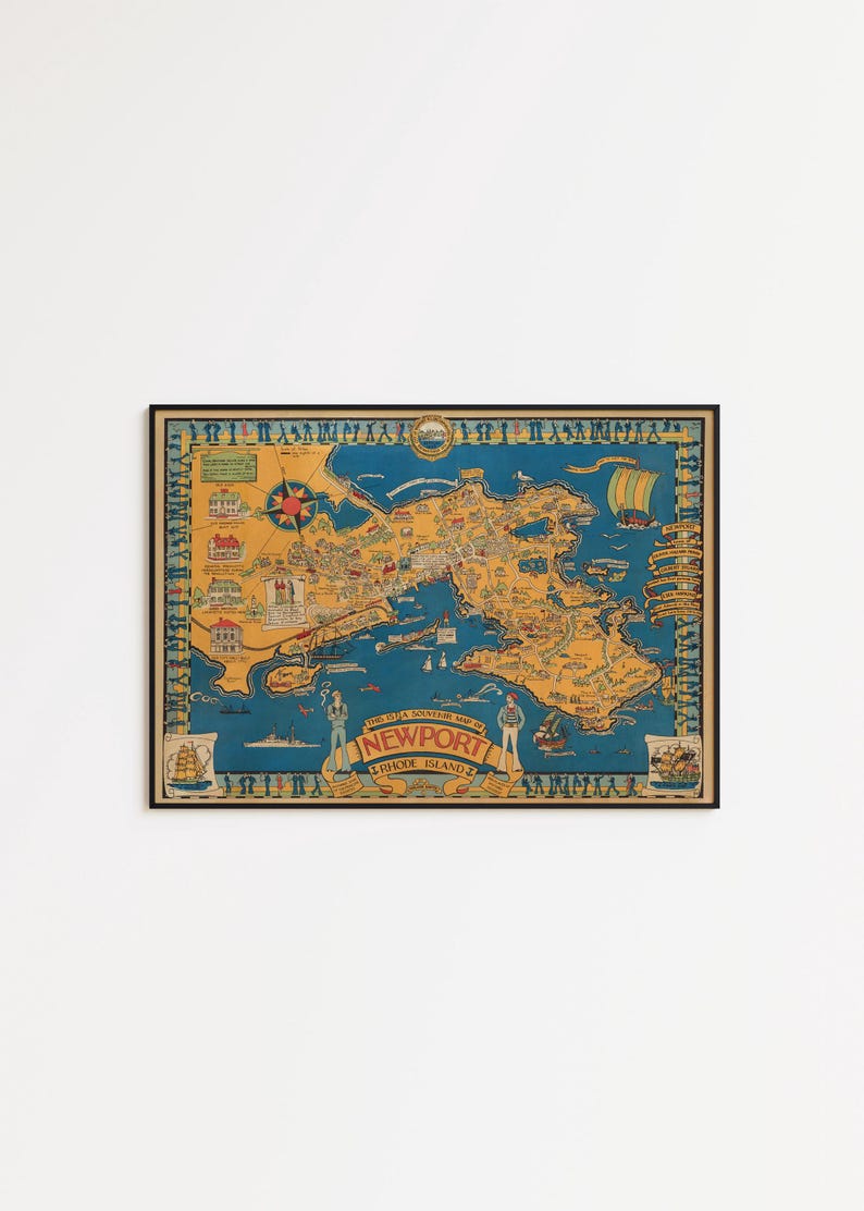 May include: A framed vintage souvenir map of Newport, Rhode Island, in a black frame. The map features a detailed illustration of the city with a blue and yellow color scheme, including landmarks, ships, and decorative borders.